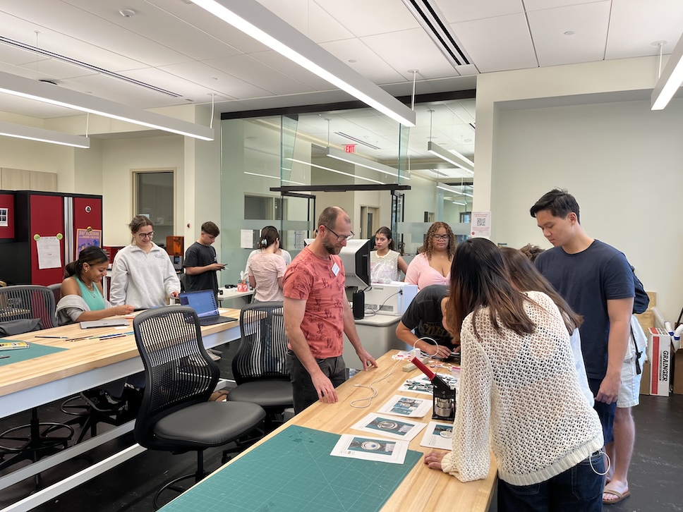 Decorative photo of Scholars' Lab's makerspace full of makers