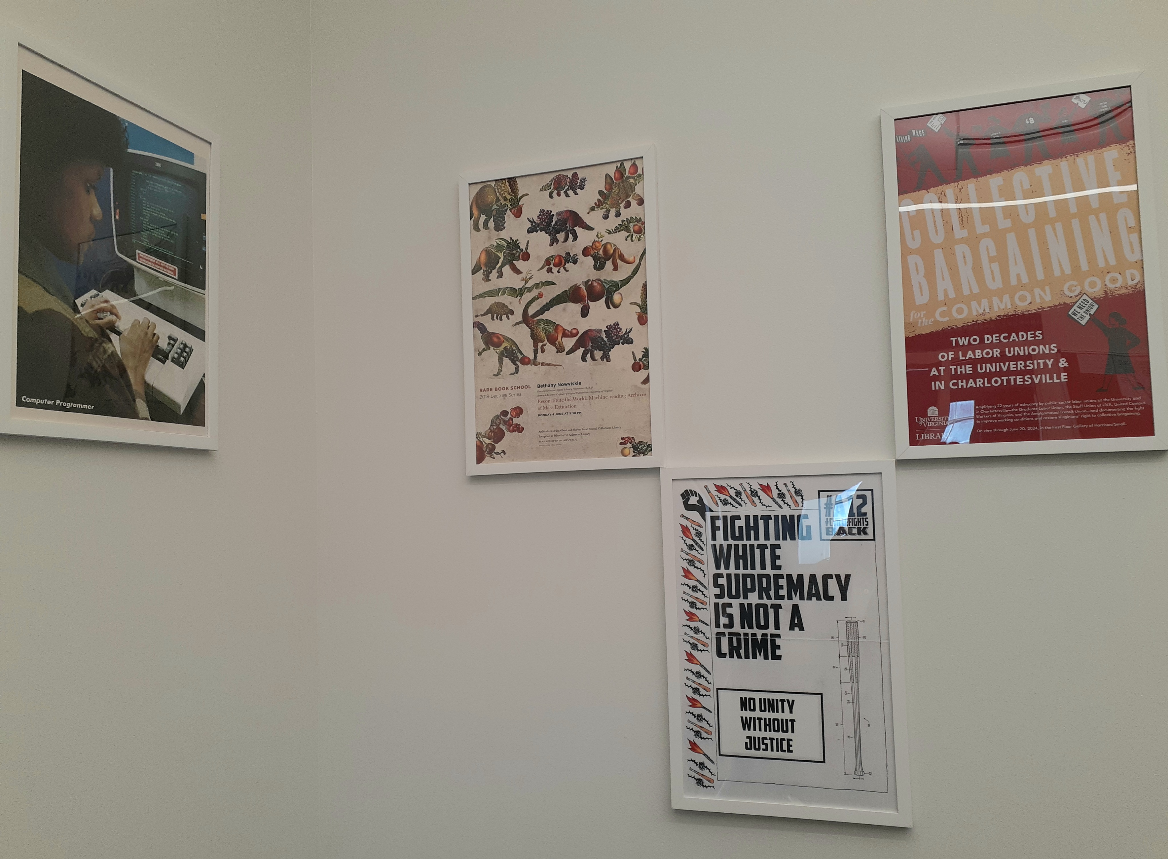 close up of four posters in the scholars' lab student lounge